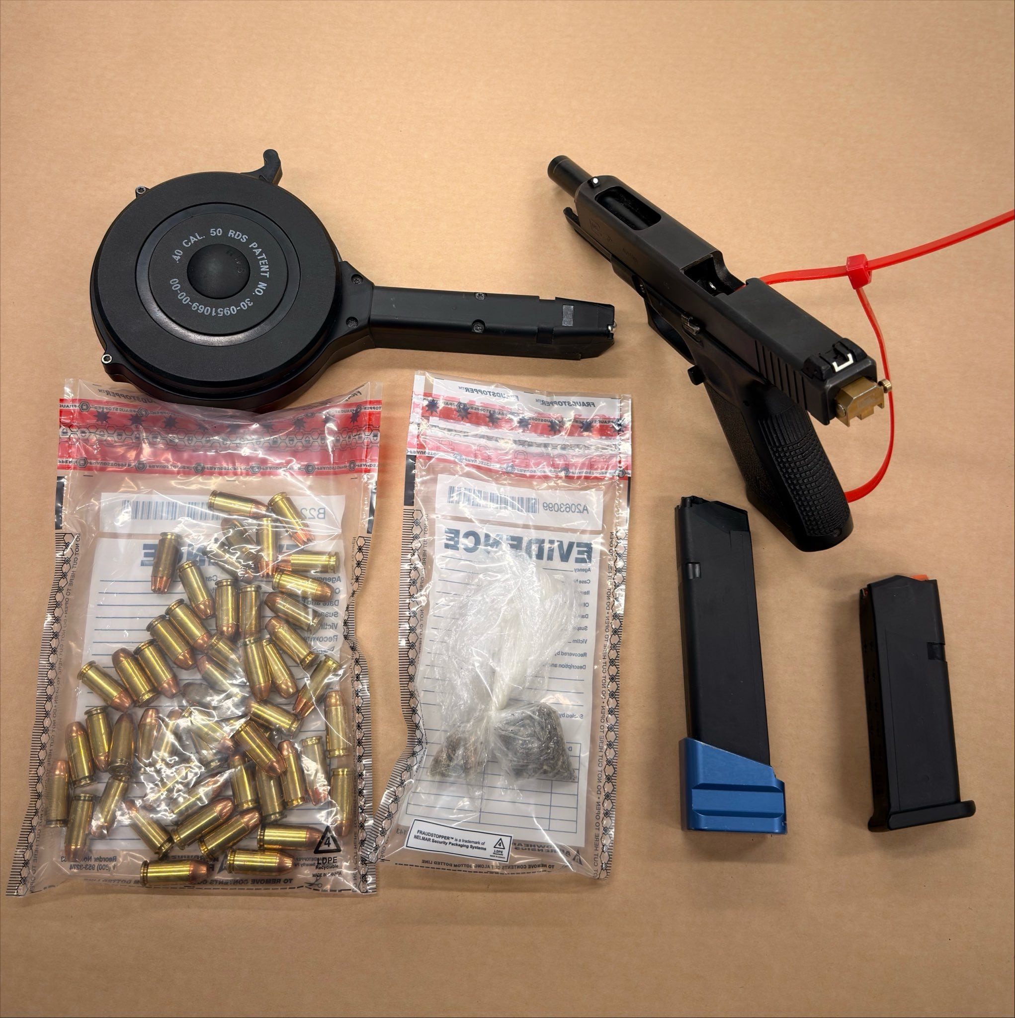 Window Tint Violation Leads to Arrest, Discovery of Illegal Weapon and Drugs