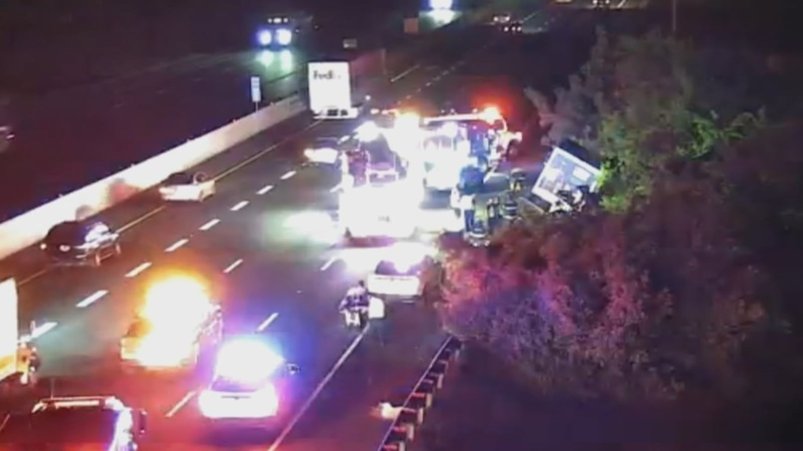 Commercial truck crashes into tree line along interstate in Nashville