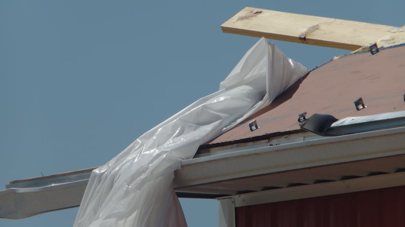 Roofs were torn apart at Overholt’s Farm Market from an EF-1 tornado.