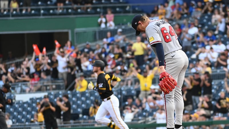 Atlanta Braves starting pitcher Hurston Waldrep (64) hangs his head as the Pittsburgh Pirates'...