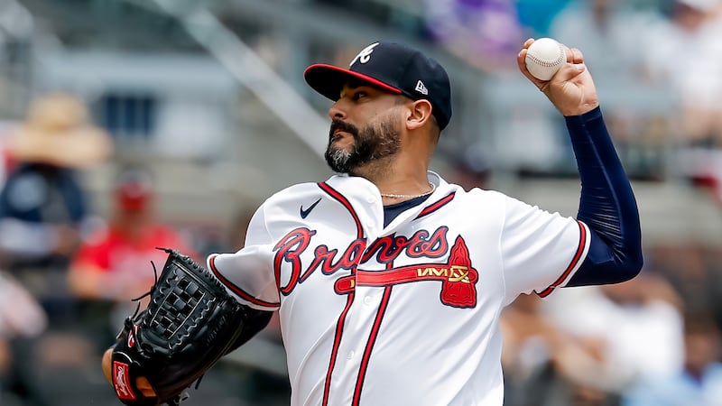 Atlanta Braves pitcher Martín Pérez delivers to a New York Mets batter during the first inning...