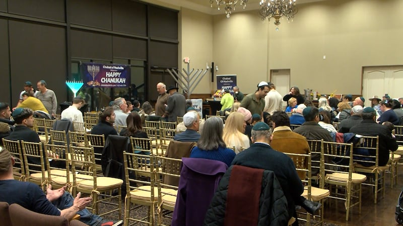 Dozens gather to mark start of Hanukkah in Nashville.