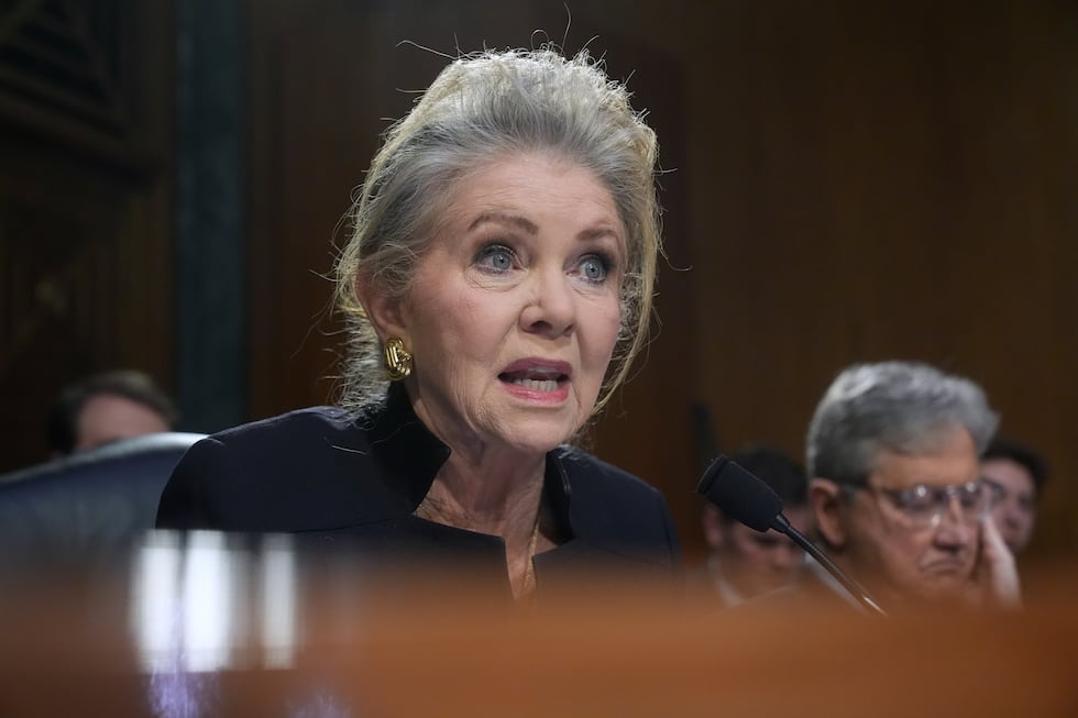 Sen. Marsha Blackburn, R-Tenn., questions Homeland Security Secretary Kristi Noem, as she...