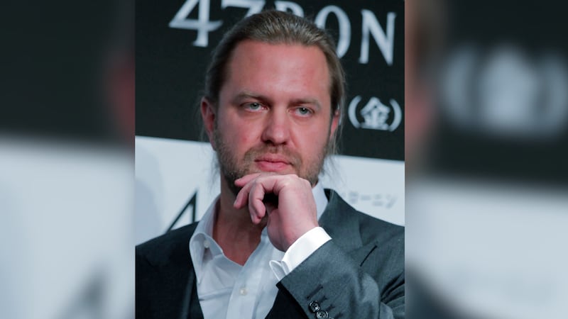 FILE - Director Carl Rinsch poses for photographers during a news conference to promote his...