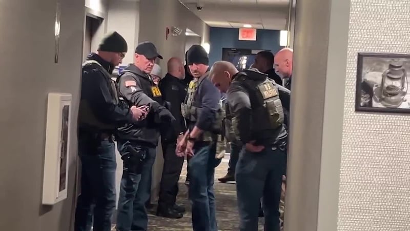 A person of interest linked to the Brown University fatal shooting is in custody, his identity...